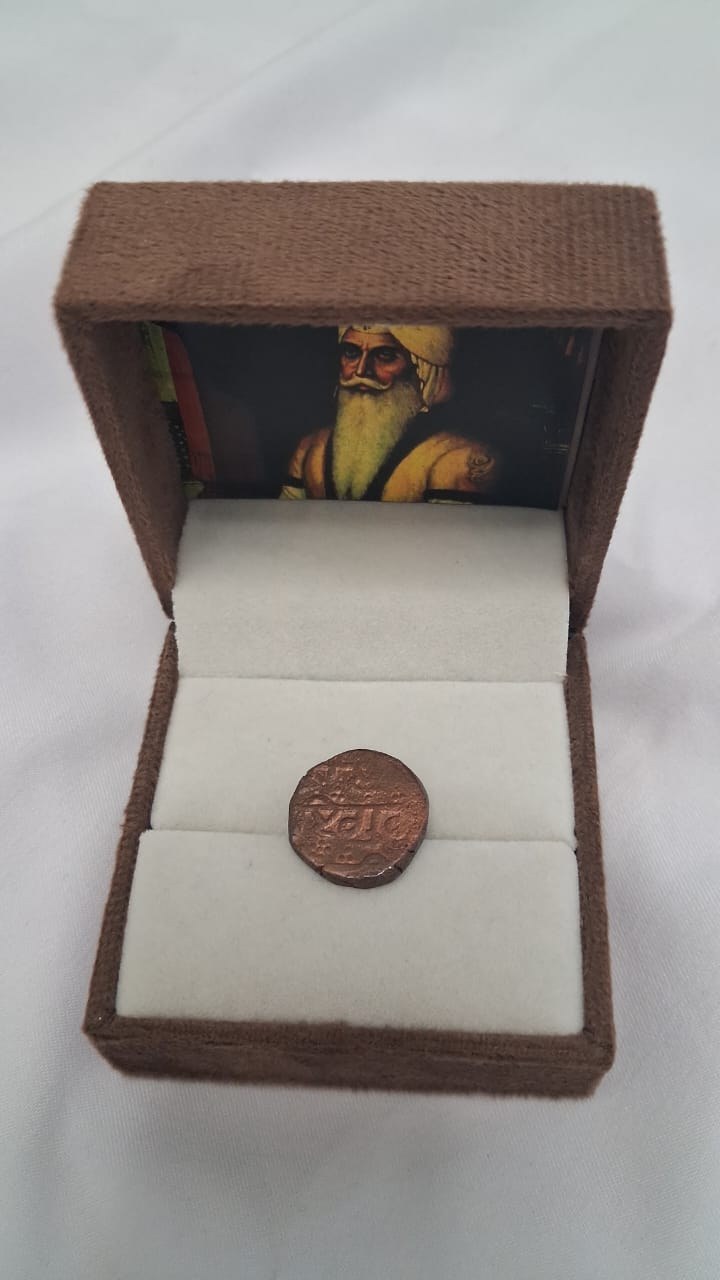 Coin bearing “Khalsa hai Akal Sahai”